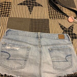 American Eagle Outfitters Light Blue Denim shirts size 10 destroyed line